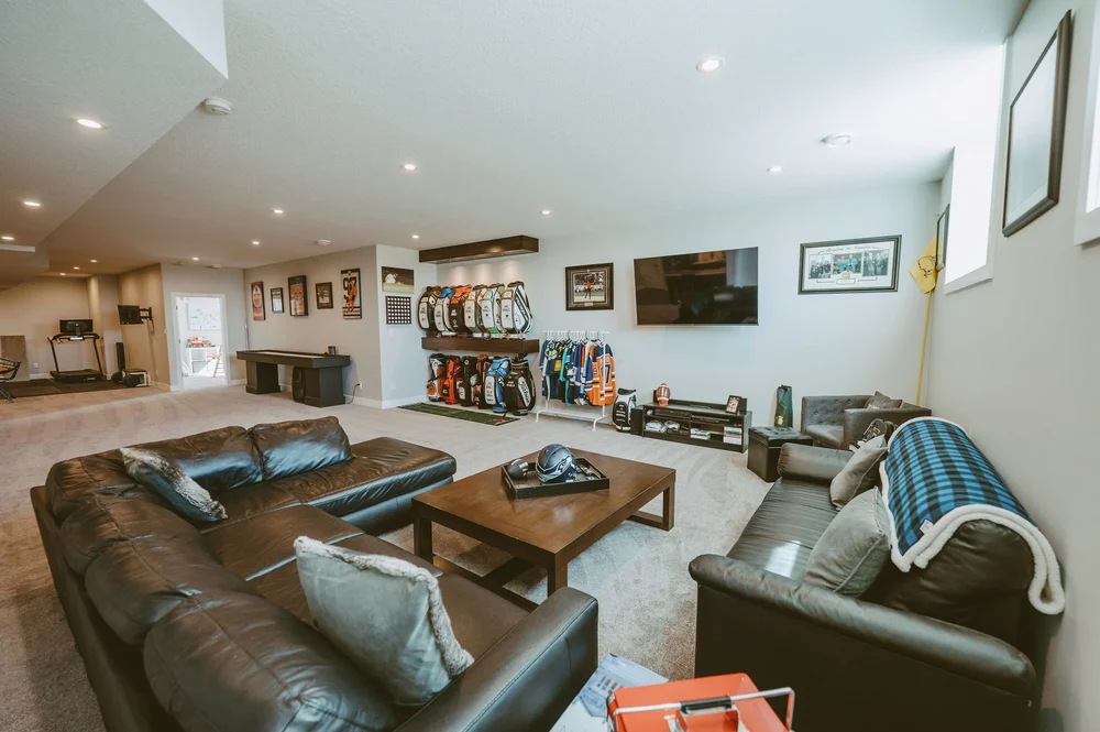Basement rec room with sports memorabilia