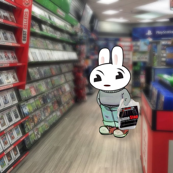 Buck the Bunny standing in a GameStop store aisle