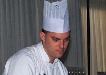 A candid shot of Jeremy Leinen working in the kitchen