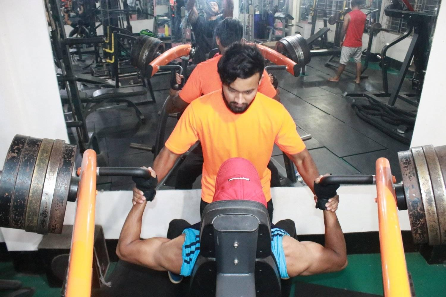 Member performing chest press