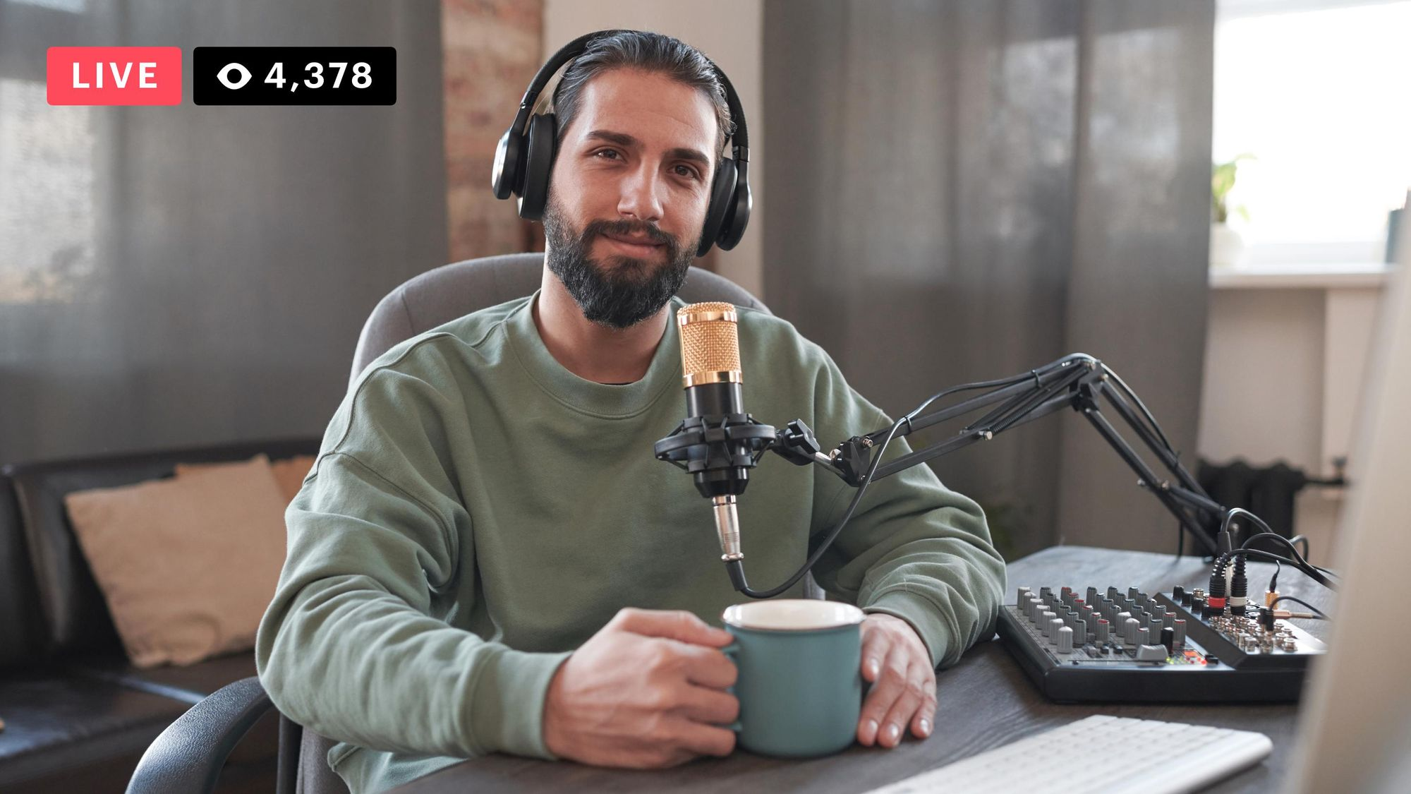 Podcaster sitting at a desk with a condenser microphone, over-ear headphones, and an audio mixer — showing a live stream with 4,378 viewers
