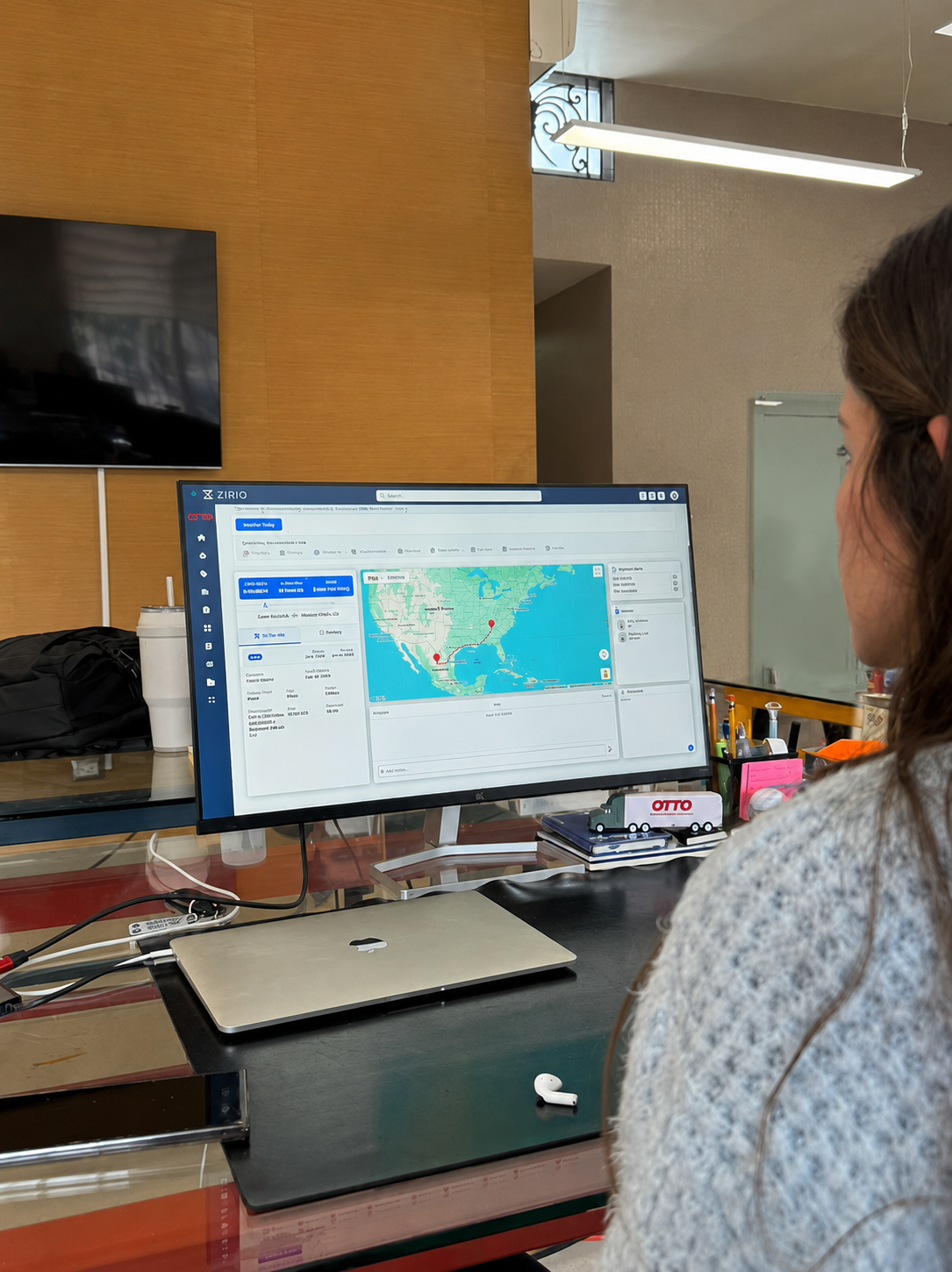 Team using Zirio platform in office