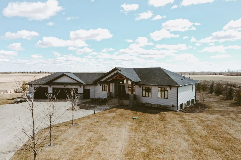 Exterior front view with prairie landscape