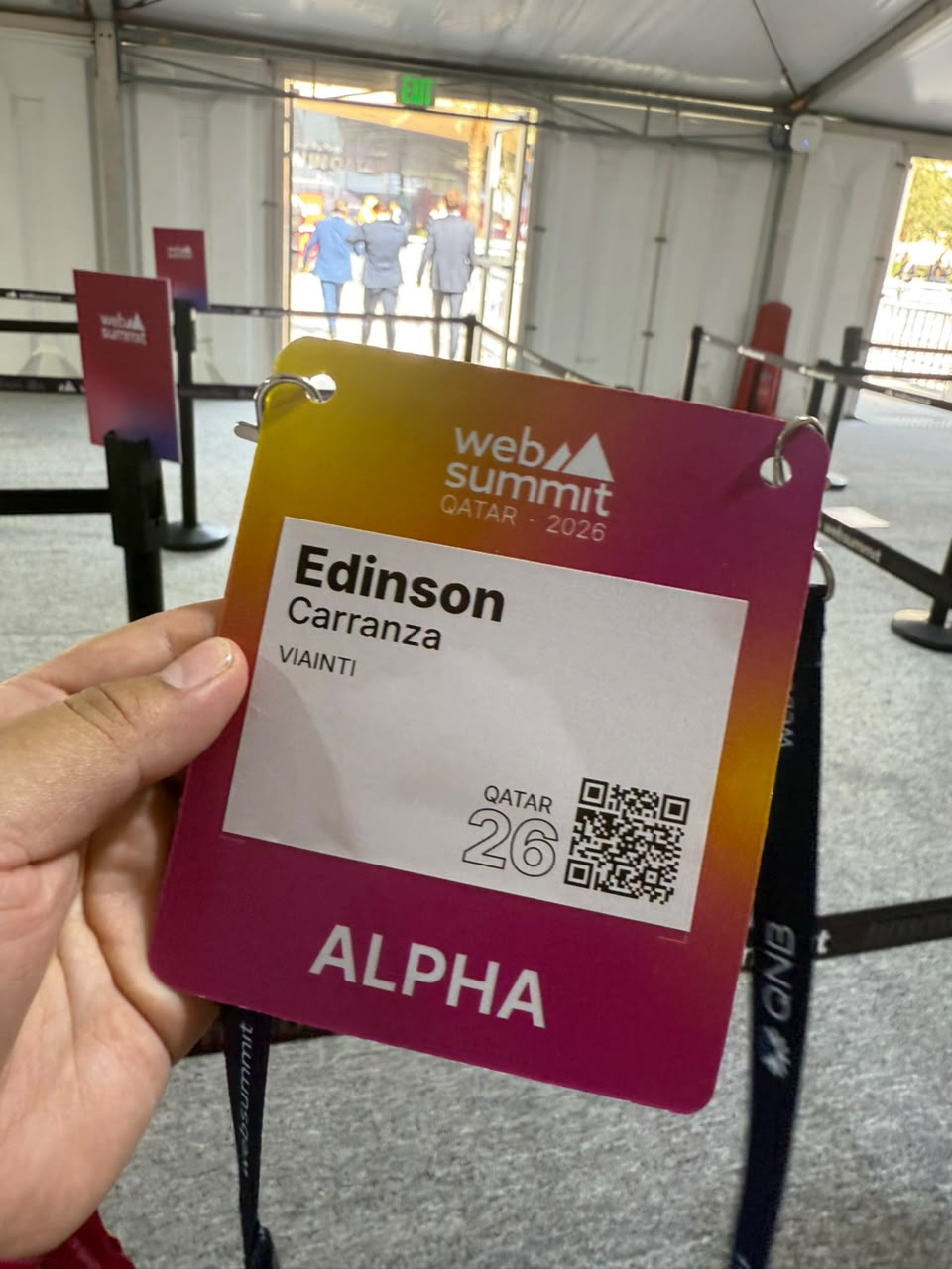 Edinson Carranza WebSummit Qatar 2026 ALPHA badge for VIAINTI