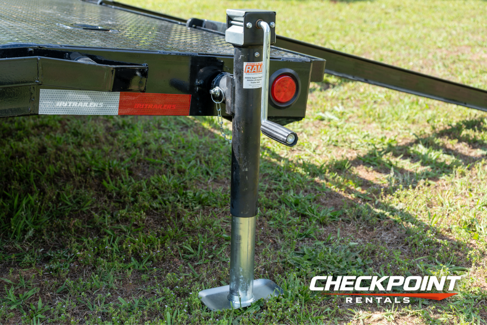 RAM jack stand close-up detail on car hauler