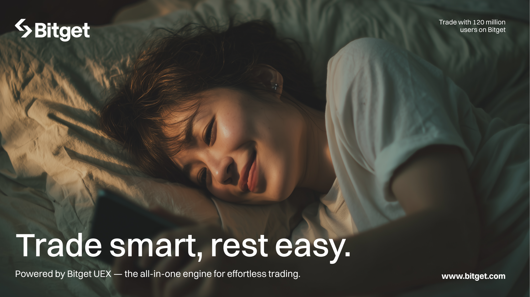 Trade smart, rest easy — Bitget UEX campaign, woman lying in bed with phone