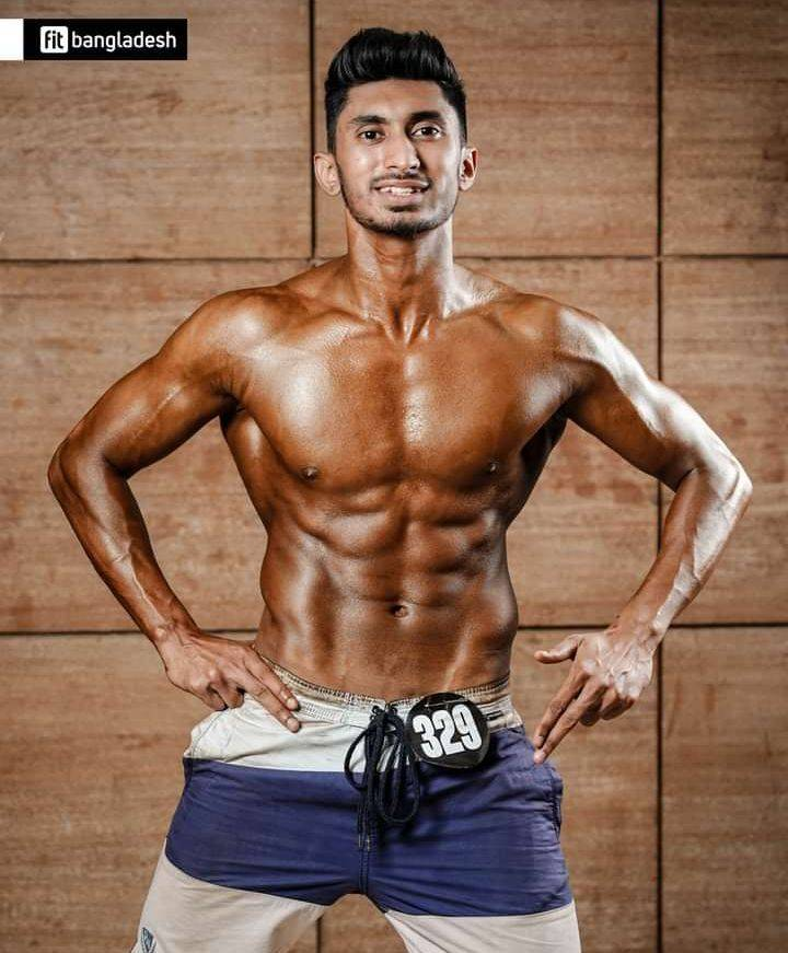 Fitness competitor posing