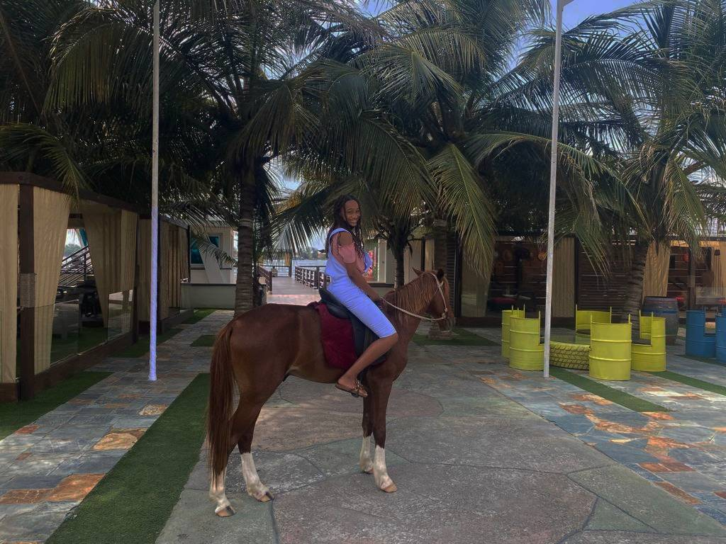 Horse riding on pristine beach