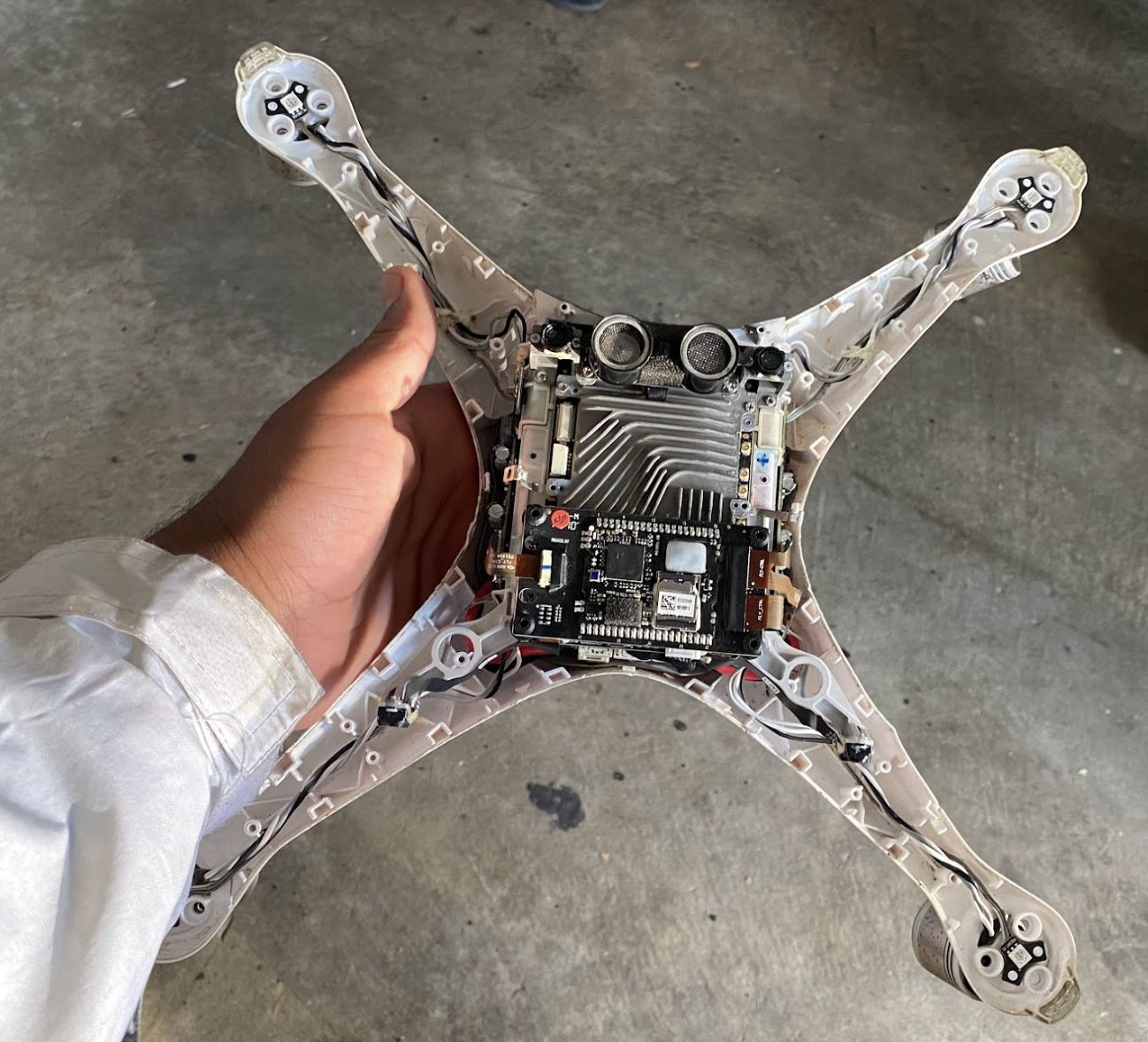 Open drone chassis showing electronics and flight hardware