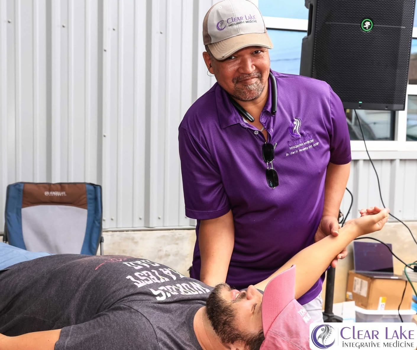 Chiropractor treating patient for back pain, neck pain, and chronic conditions