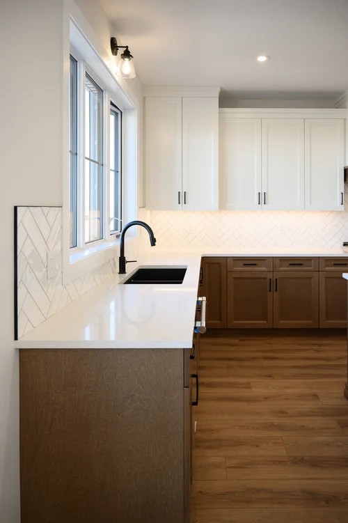 Kitchen with white uppers and oak lowers
