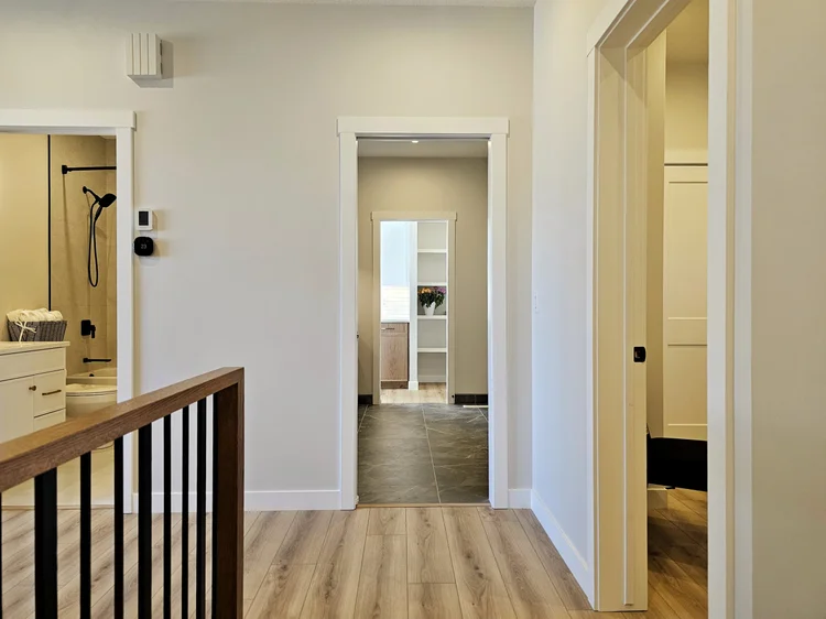 Upper hallway looking to bathroom