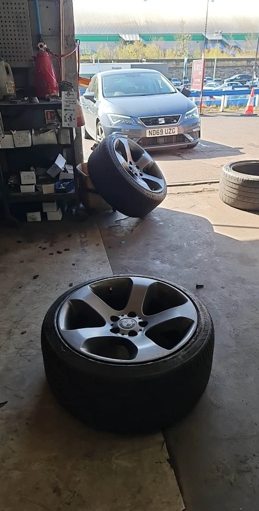 Wheel fitting in workshop