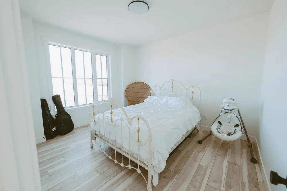 Guest bedroom with iron bed