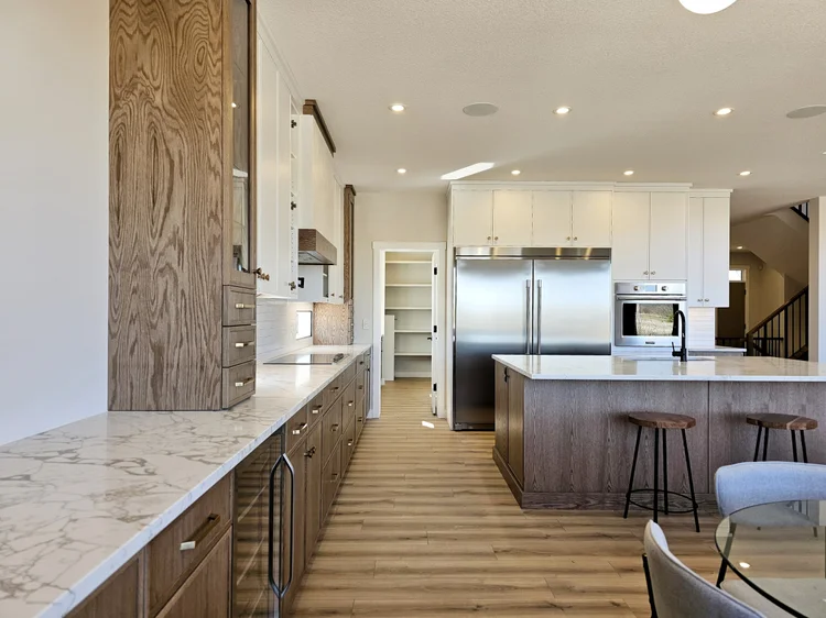 Kitchen with oak and white cabinetry