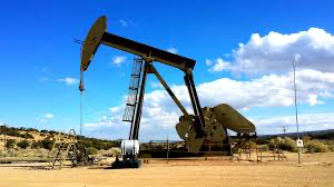 Oil pumpjack in desert landscape