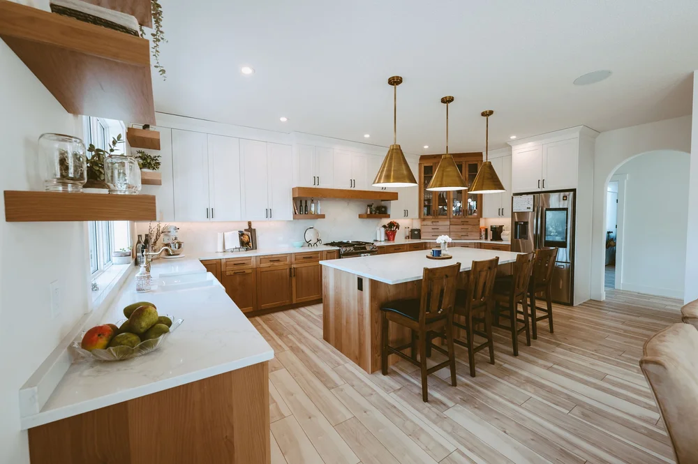 Kitchen with brass pendants wide