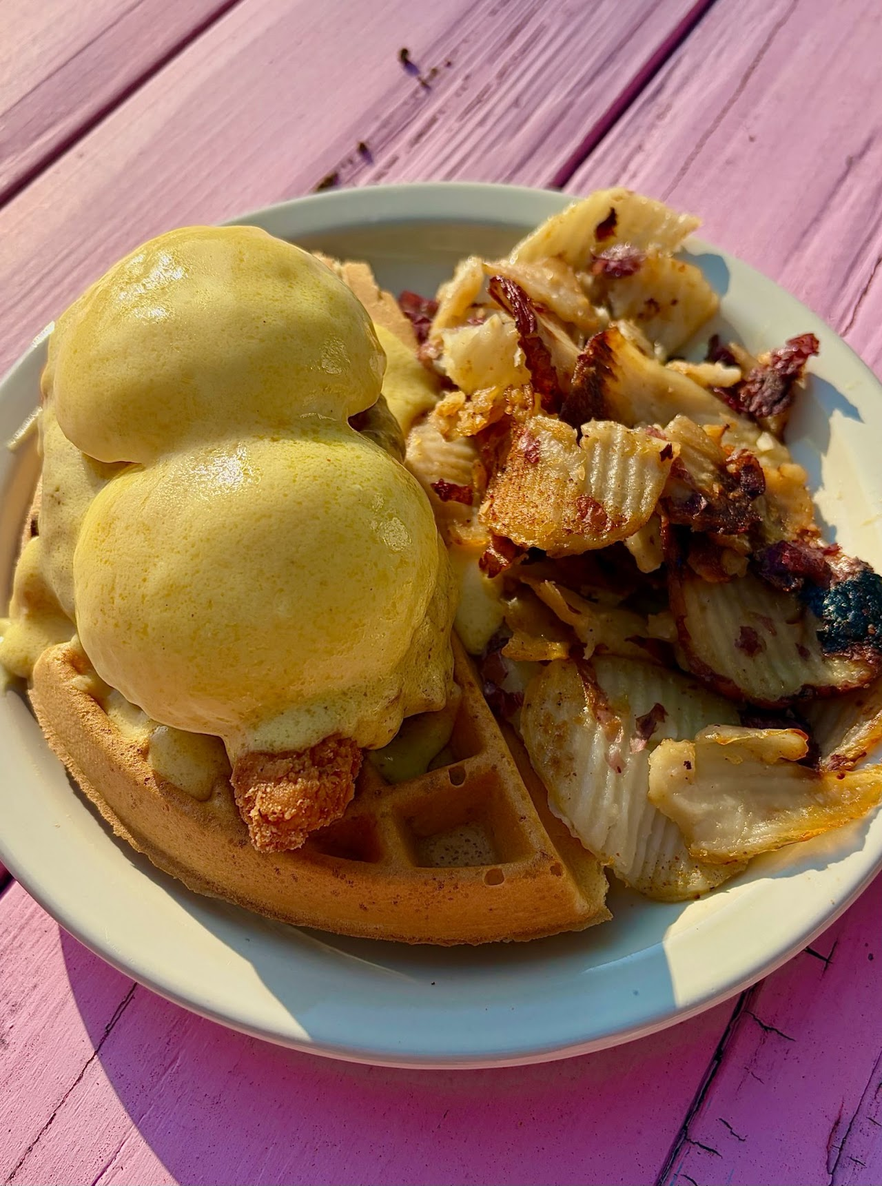 Waffle with eggs, chicken, and home fries