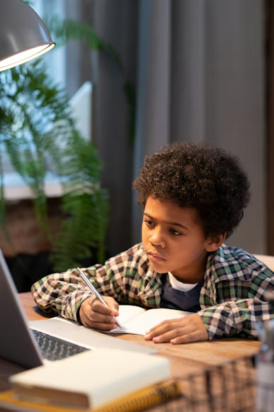 Engaged student learning at desk