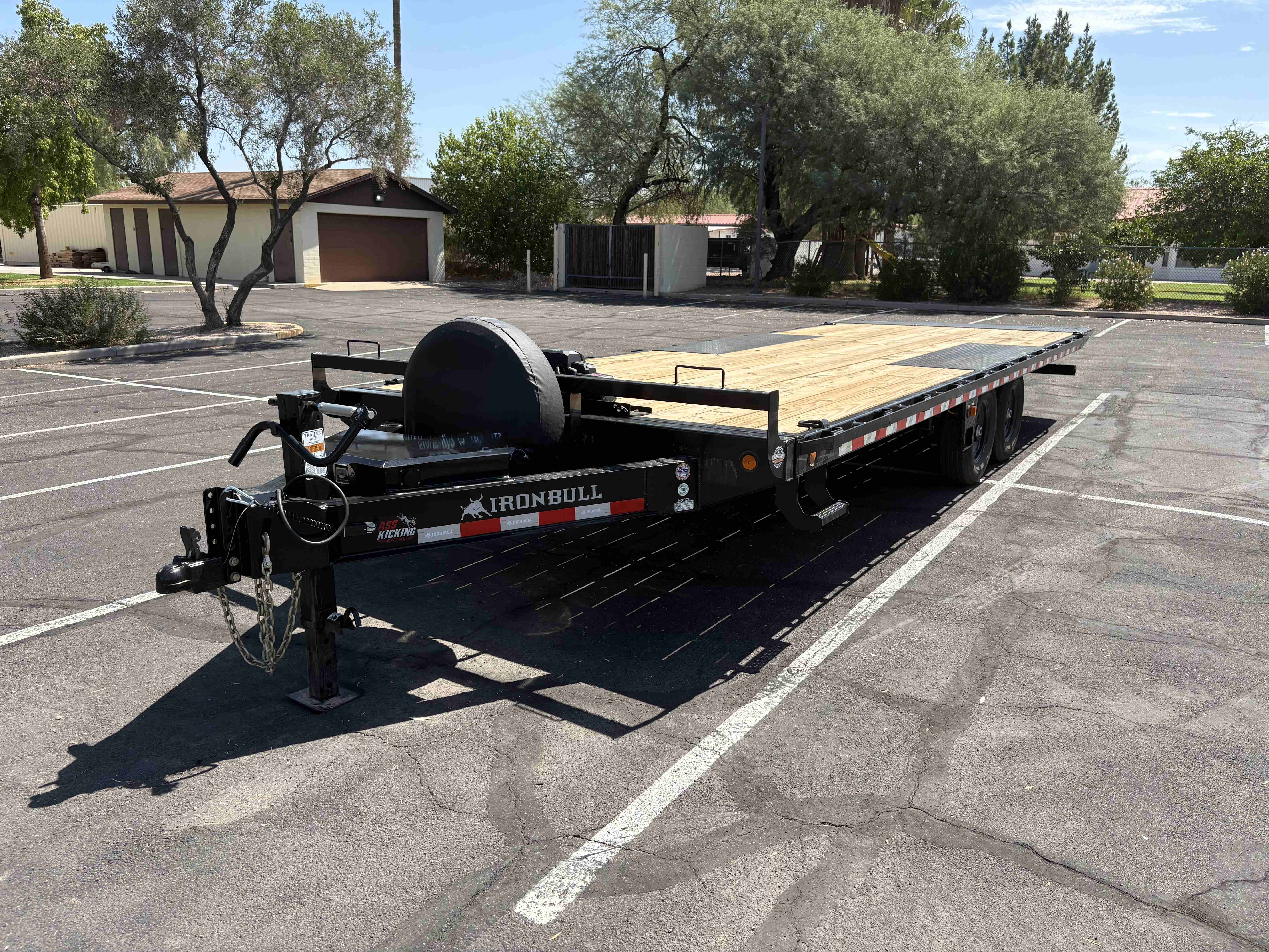 Ironbull 24ft tilt trailer front coupler view with wood deck — Ass Kicking Rentals LLC Mesa AZ