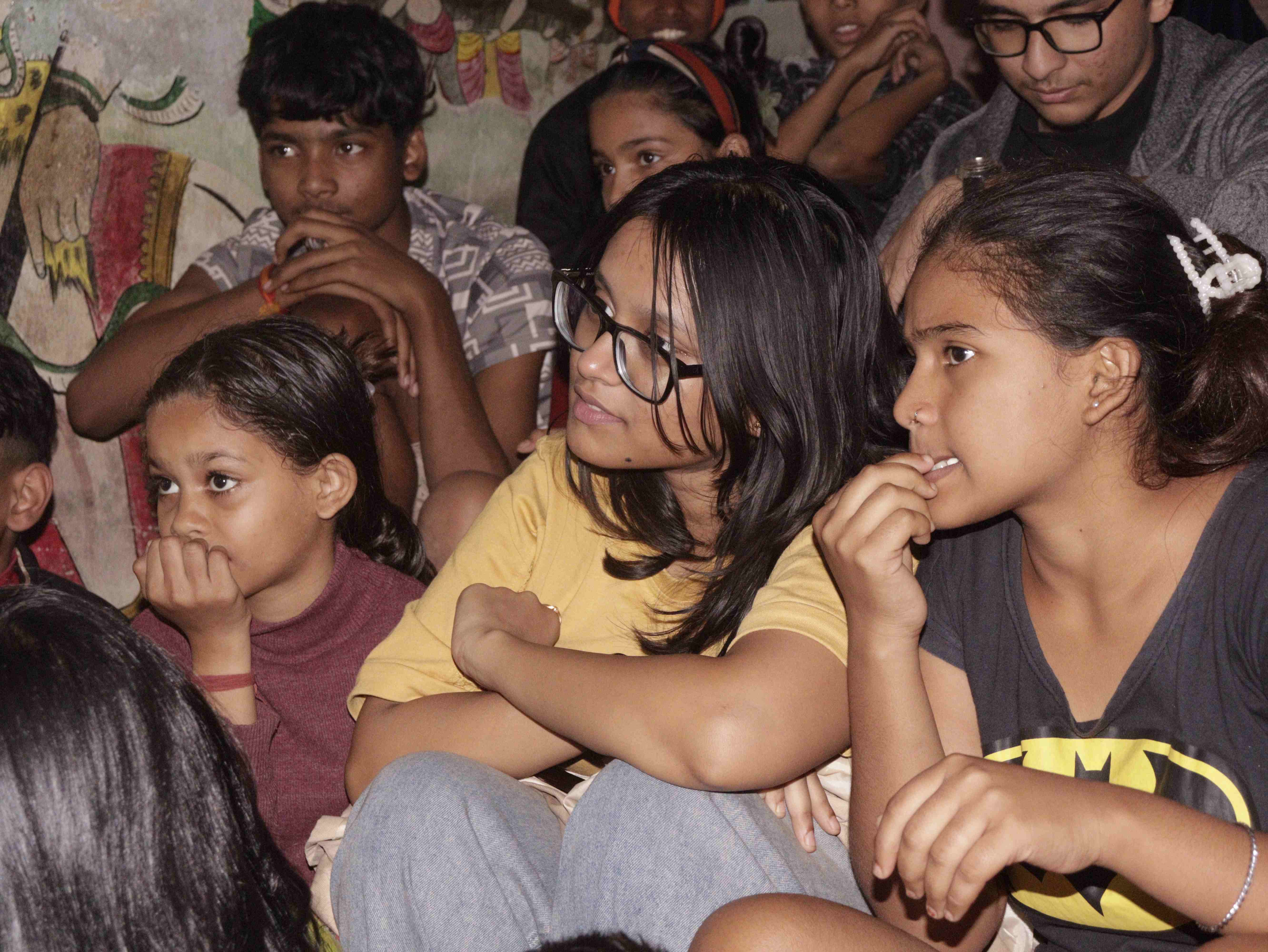 Children engaged in thoughtful discussion