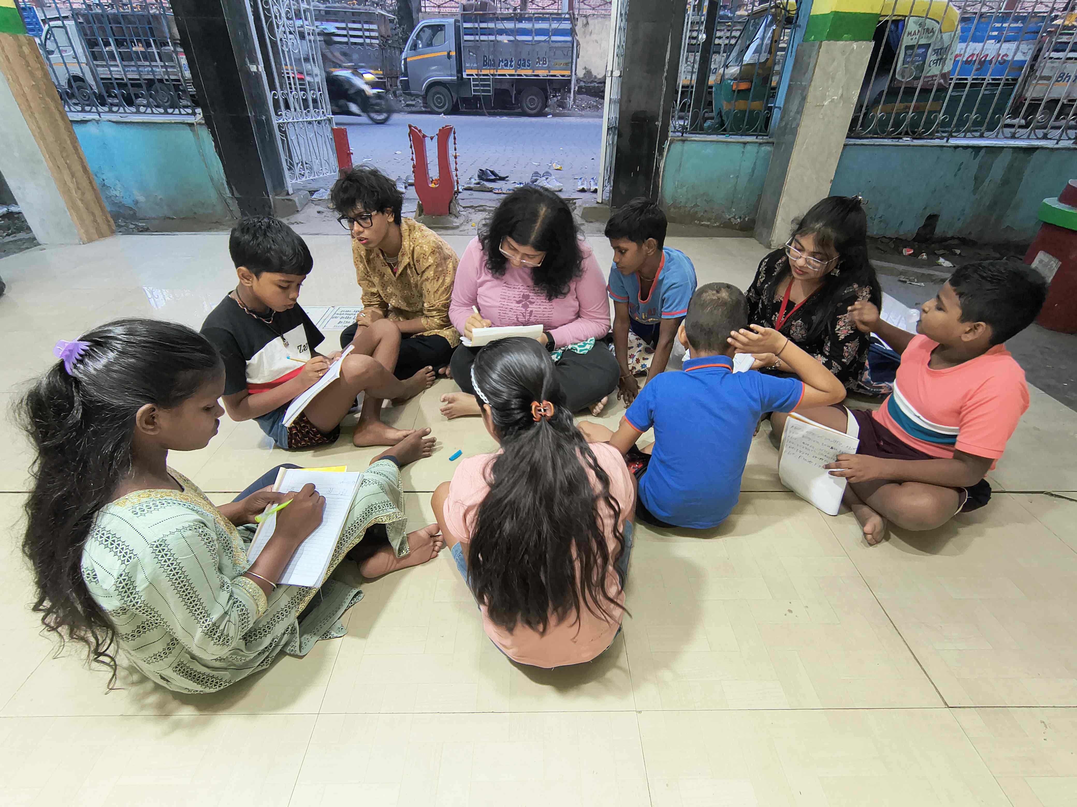 Instructor teaching children in circle