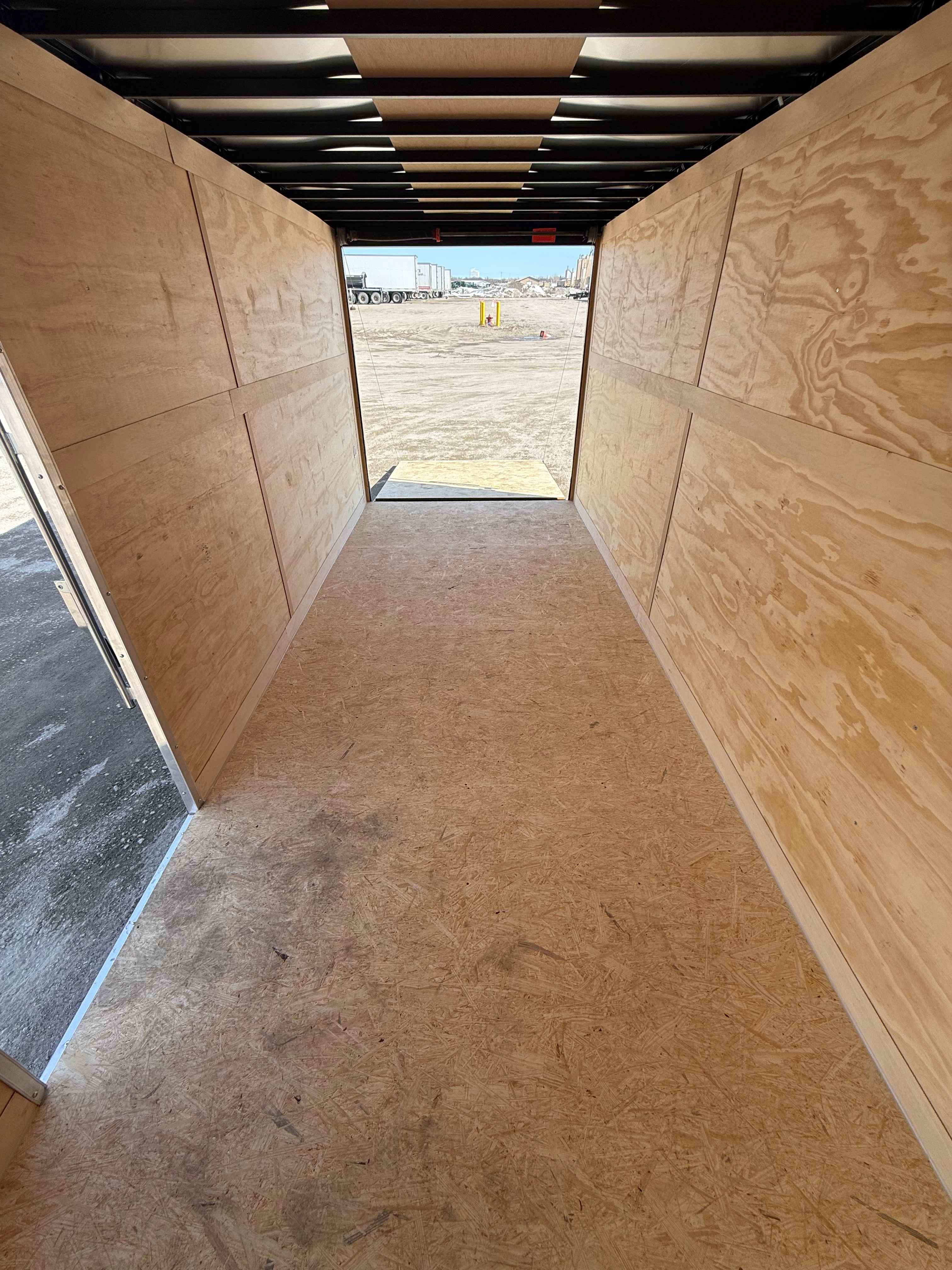7x16 Cross enclosed trailer - interior walkthrough showing wooden walls and flooring