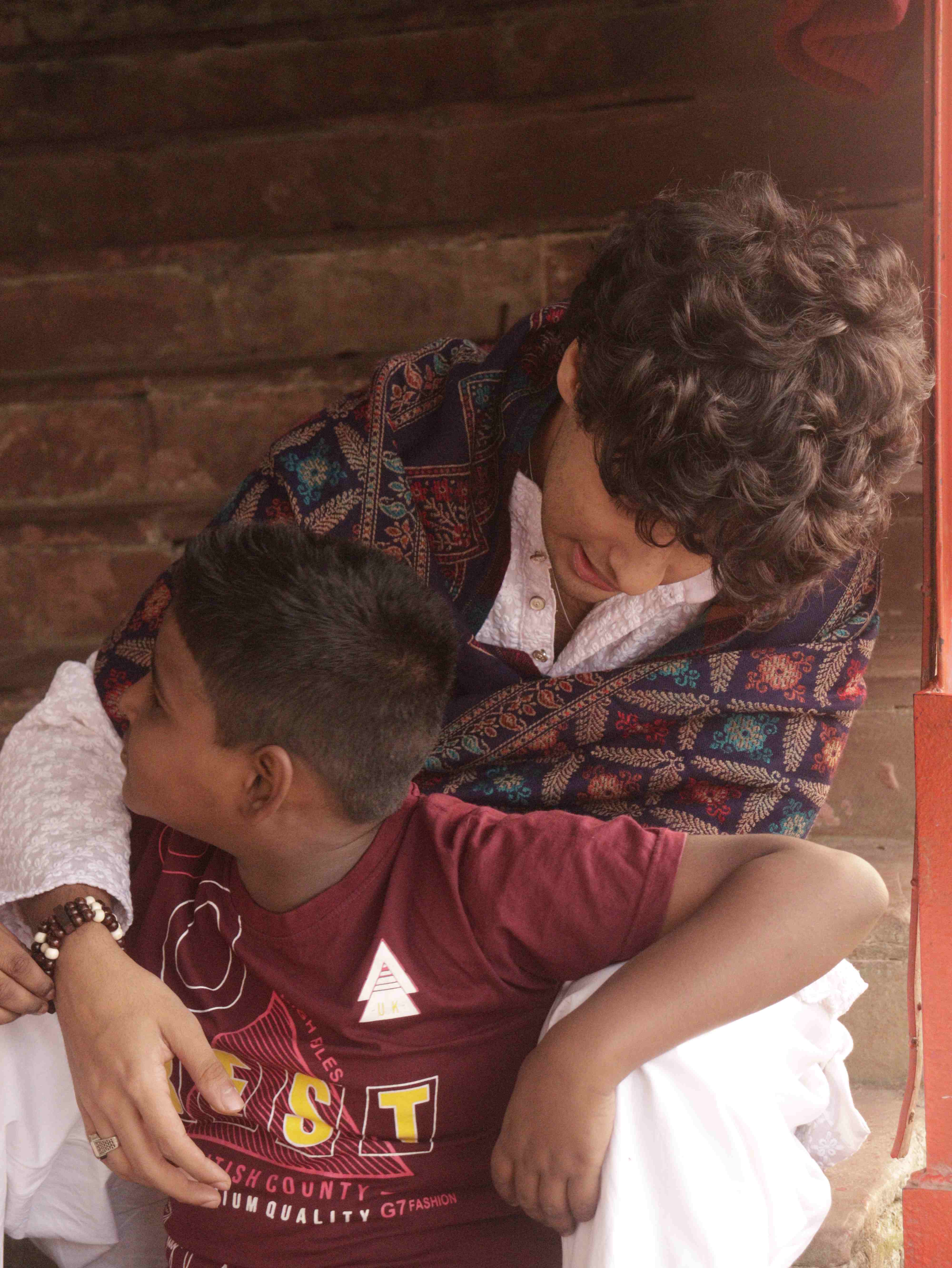 Caregiver with child in tender moment
