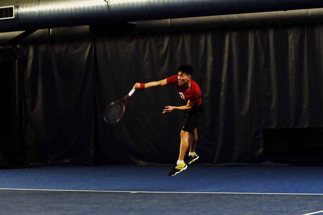 Tennis coaching action shot 2