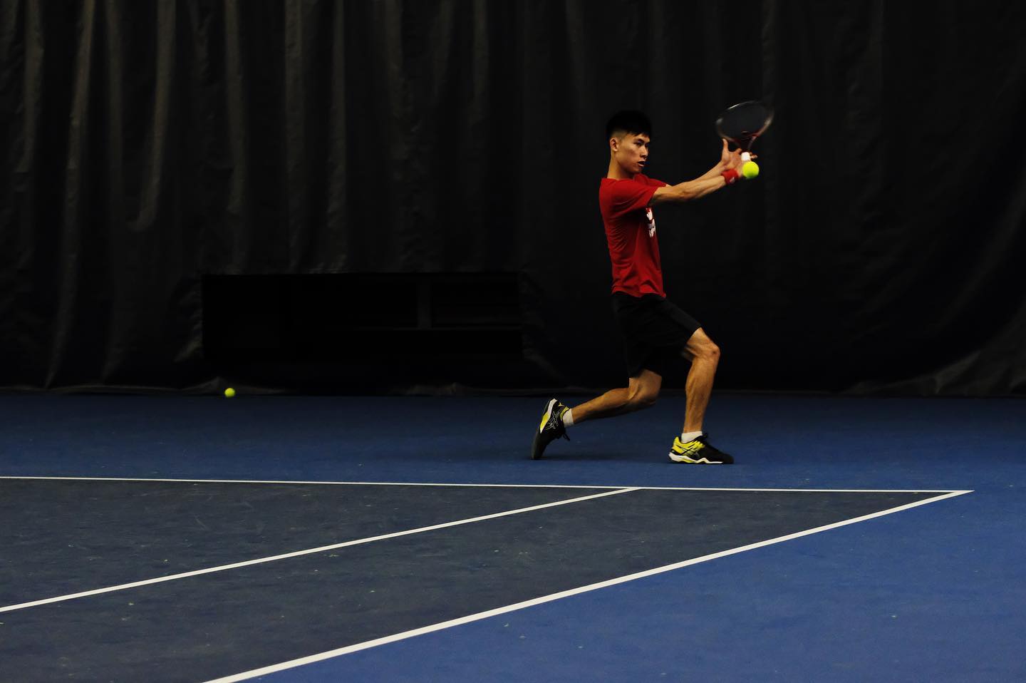 Tennis coaching action shot 1