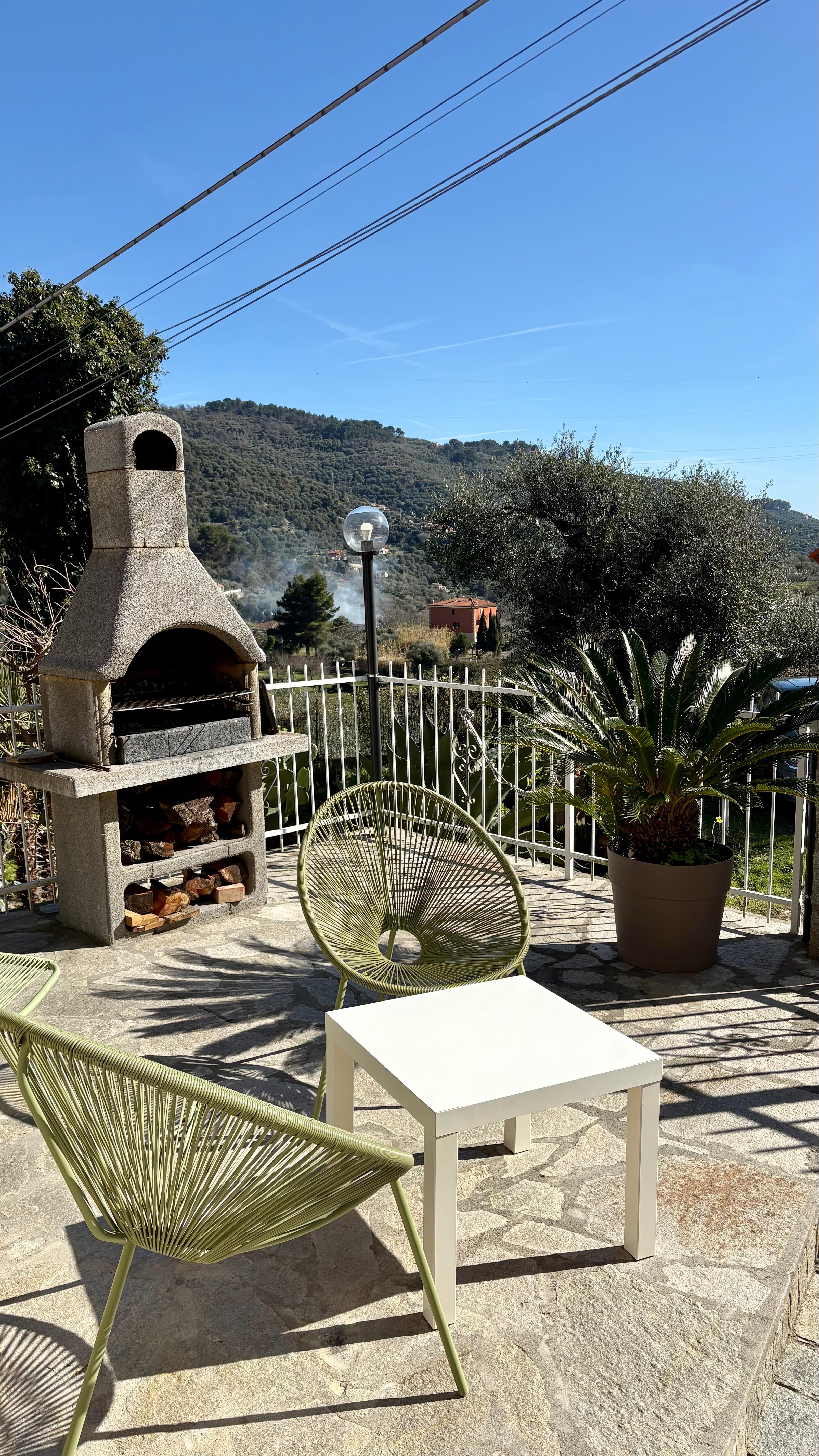 Terrazza panoramica Ca Piera vista colline olive entroterra ligure Diano Borello