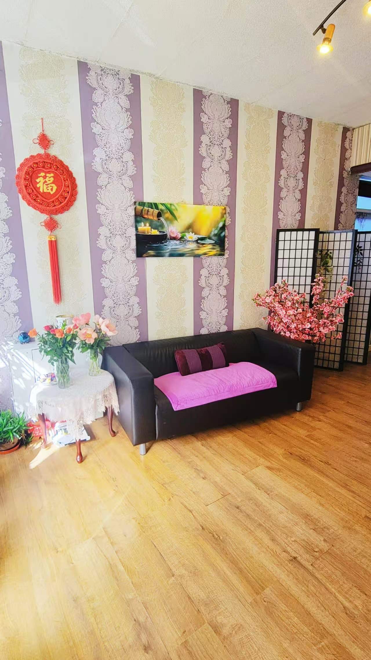 Elegant massage reception with comfortable seating