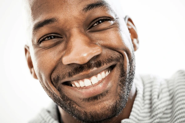 Young man with bright smile