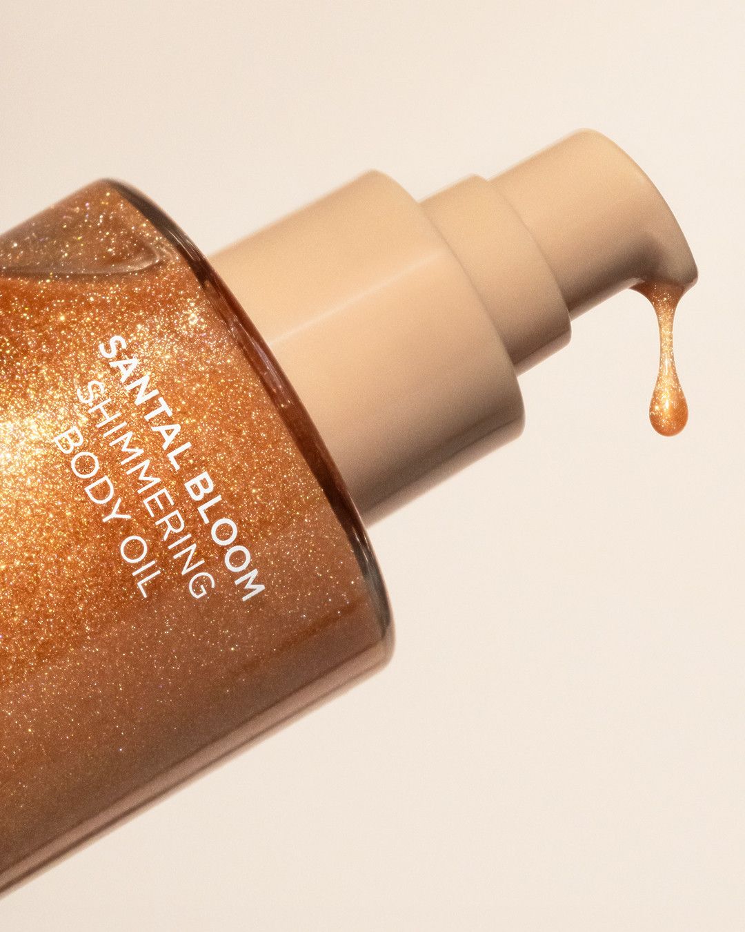 Santal Bloom Shimmering Body Oil flacon doré