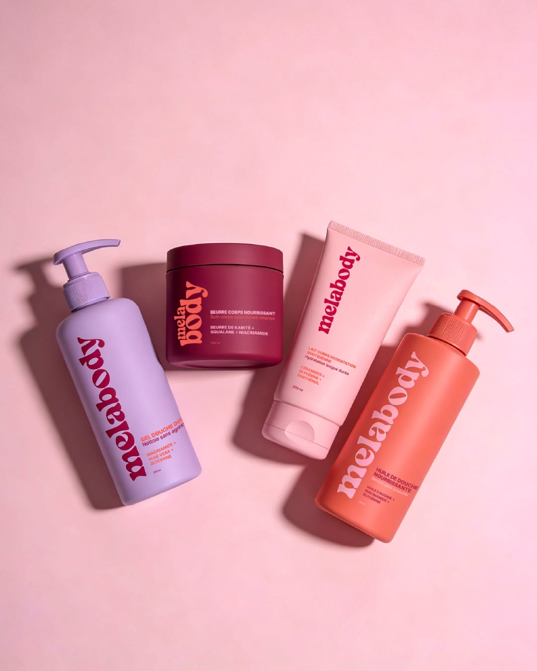 Melabody coffret corps complet 4 produits sur fond rose