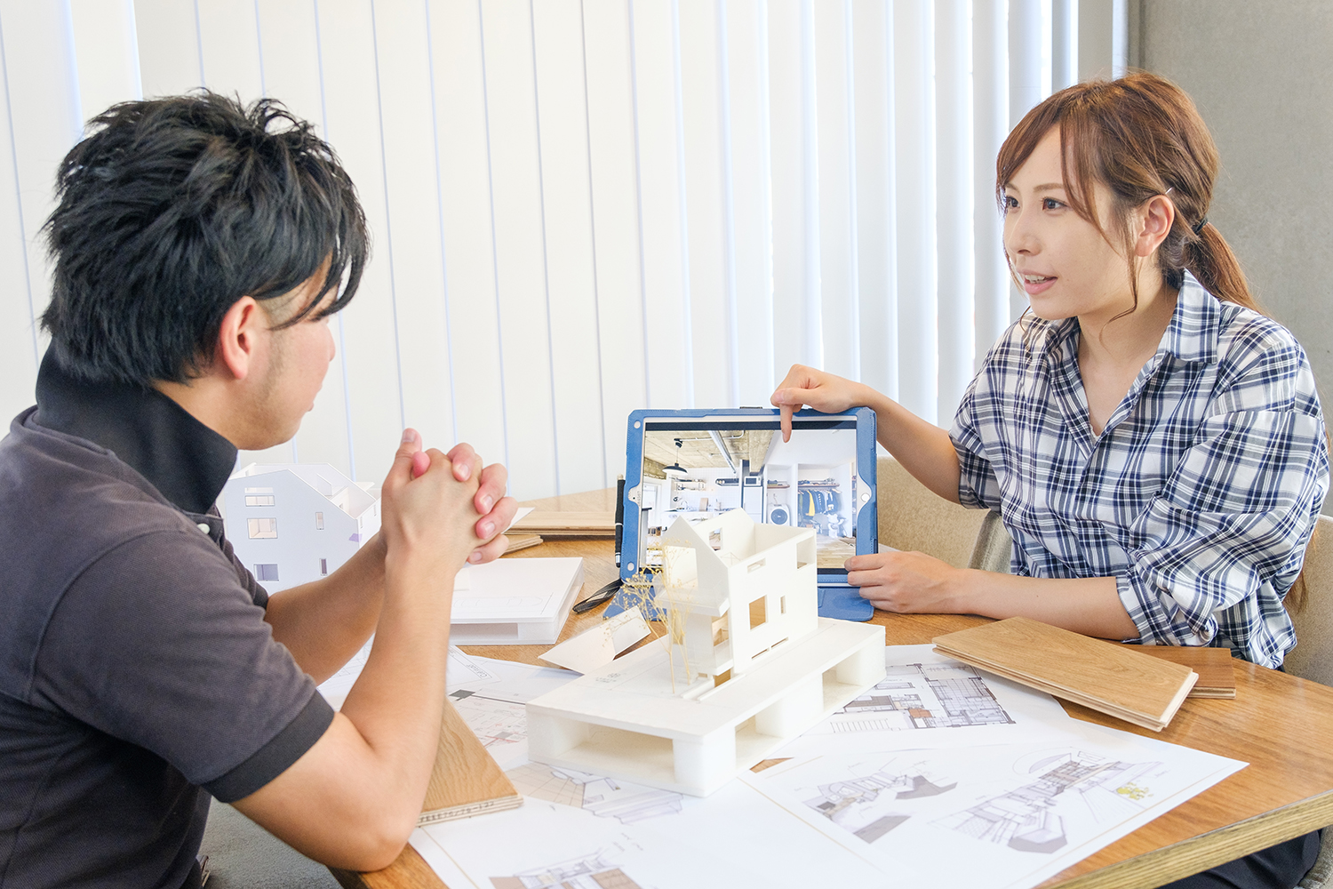 Architects discussing building plans