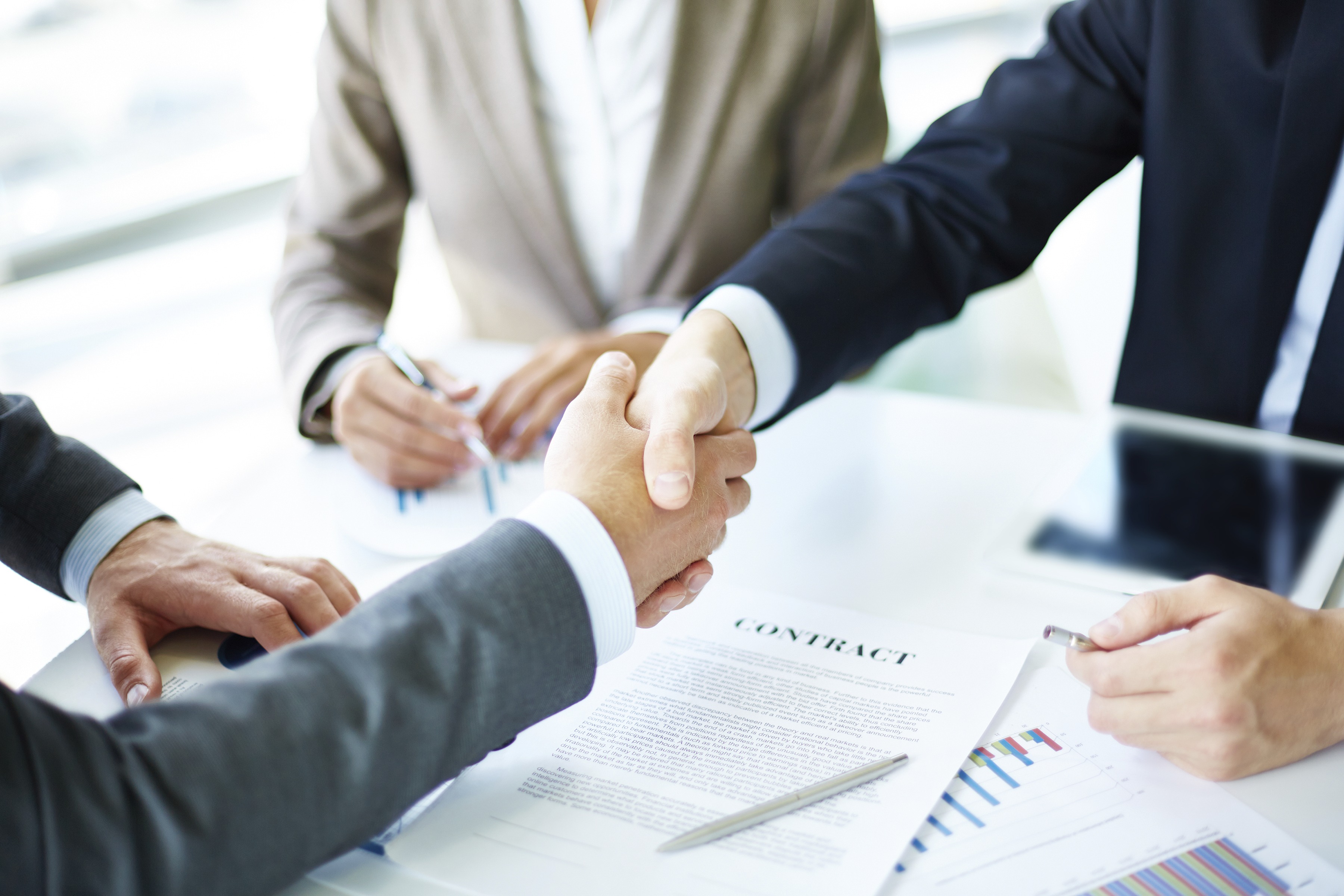 Business partnership and handshake
