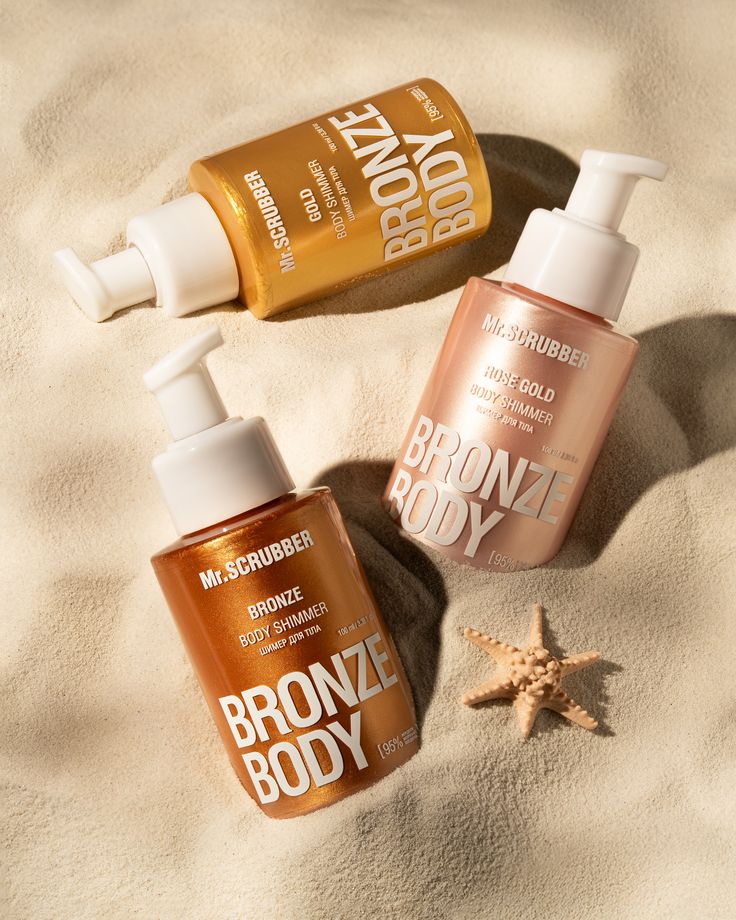 Trio Bronze Body Shimmer Mr. Scrubber sur le sable