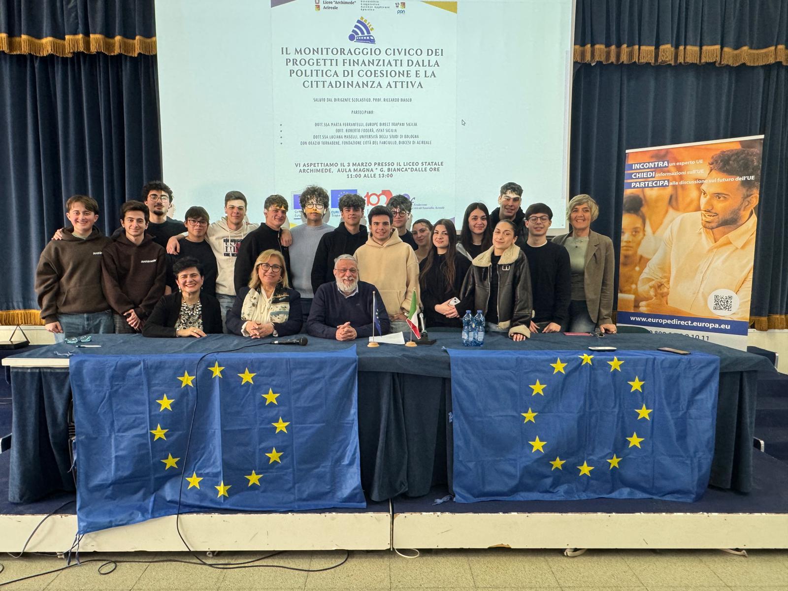 R.A.I.L.S. civic monitoring conference with EU flags and team at Liceo Archimede Acireale
