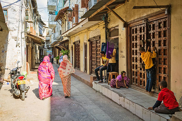 Historic Stone Town street with traditional Zanzibari architecture and colorful doors