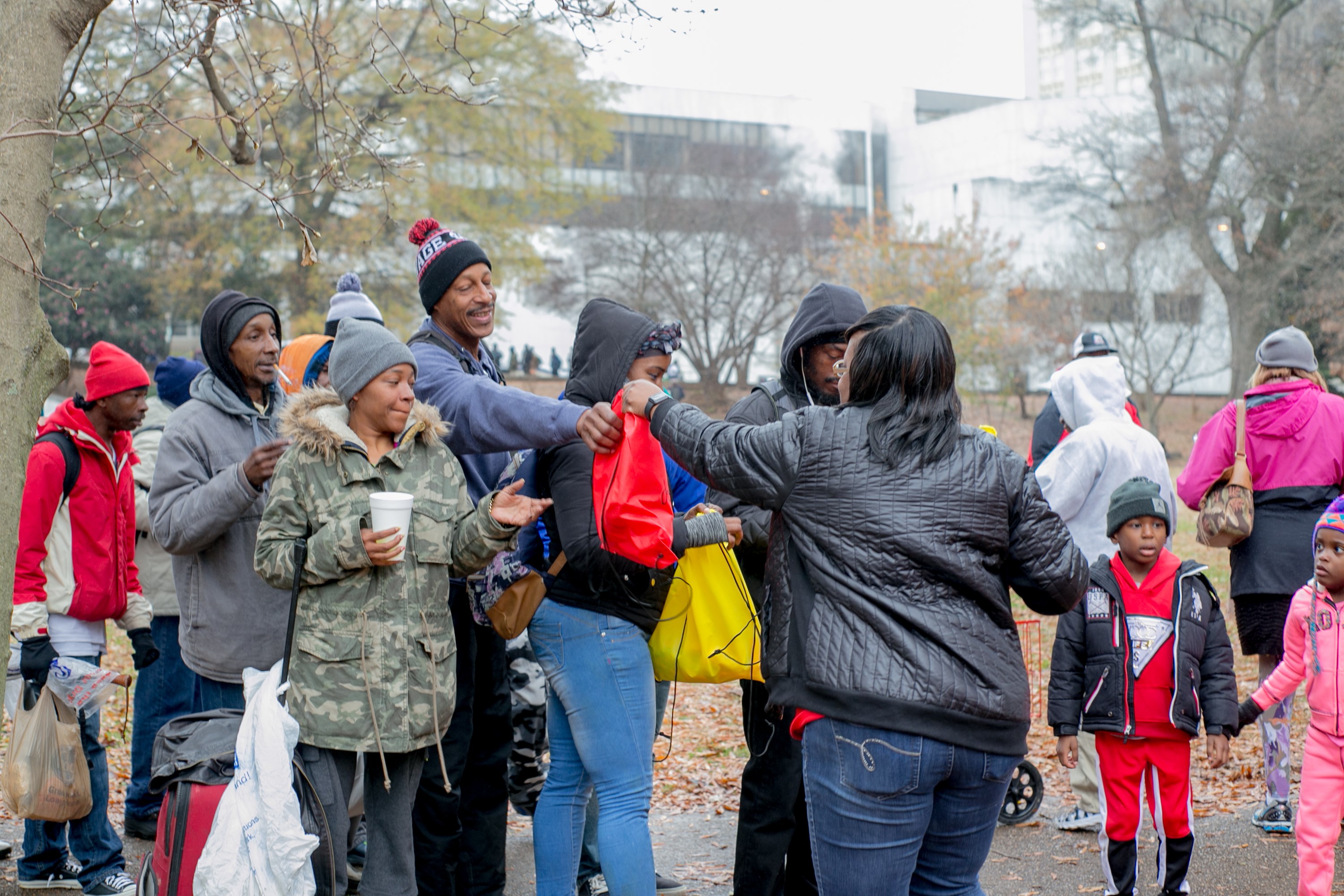 Winter outreach distributing bags to community