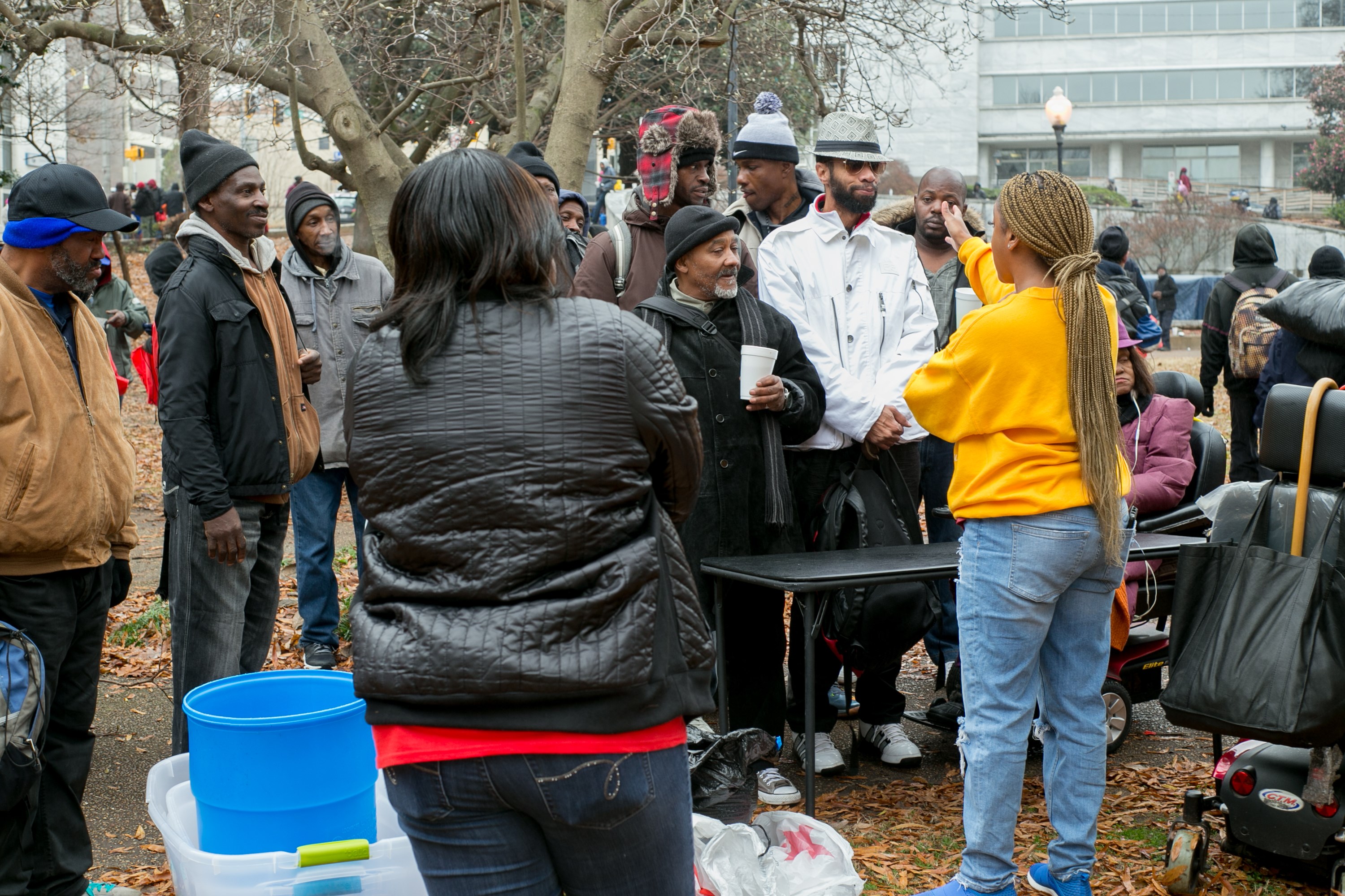 Community gathering at outdoor outreach event