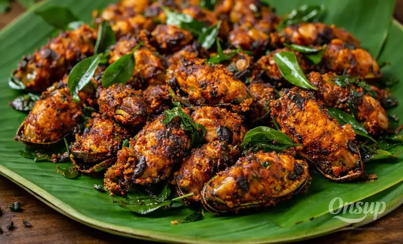 Kozhikode style Kallumakkaya fry – spiced mussels on banana leaf