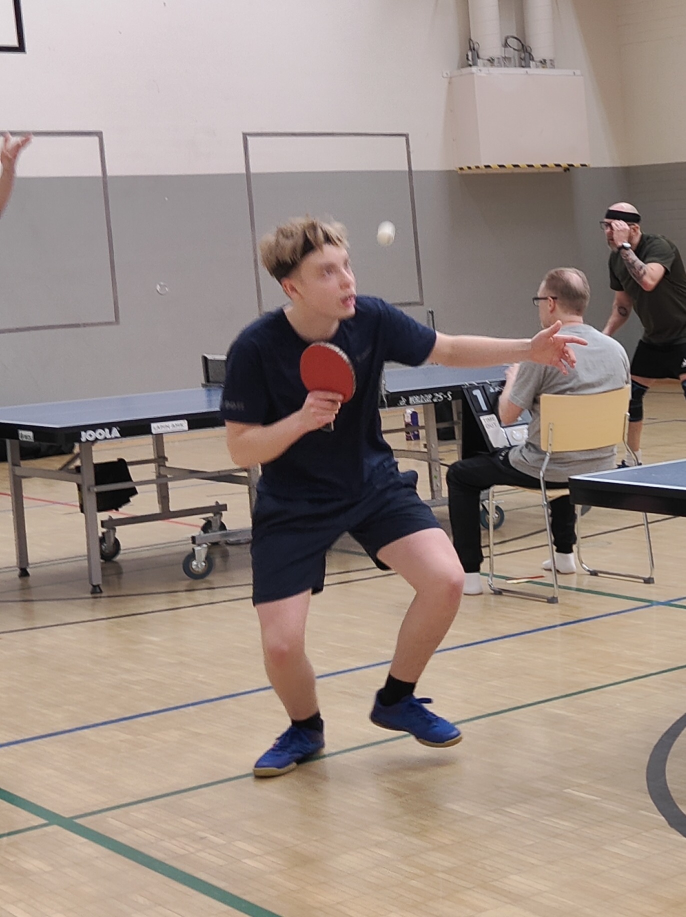 Kasperi Illikainen returning a serve mid-rally