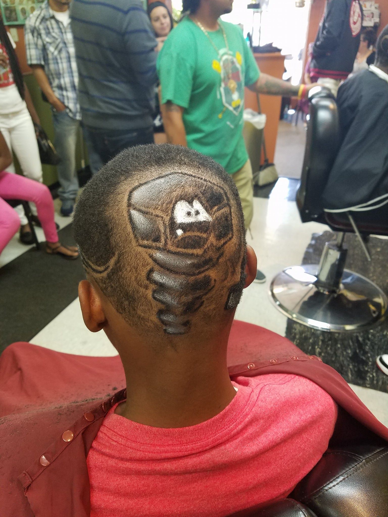 Custom character hair art on kids cut