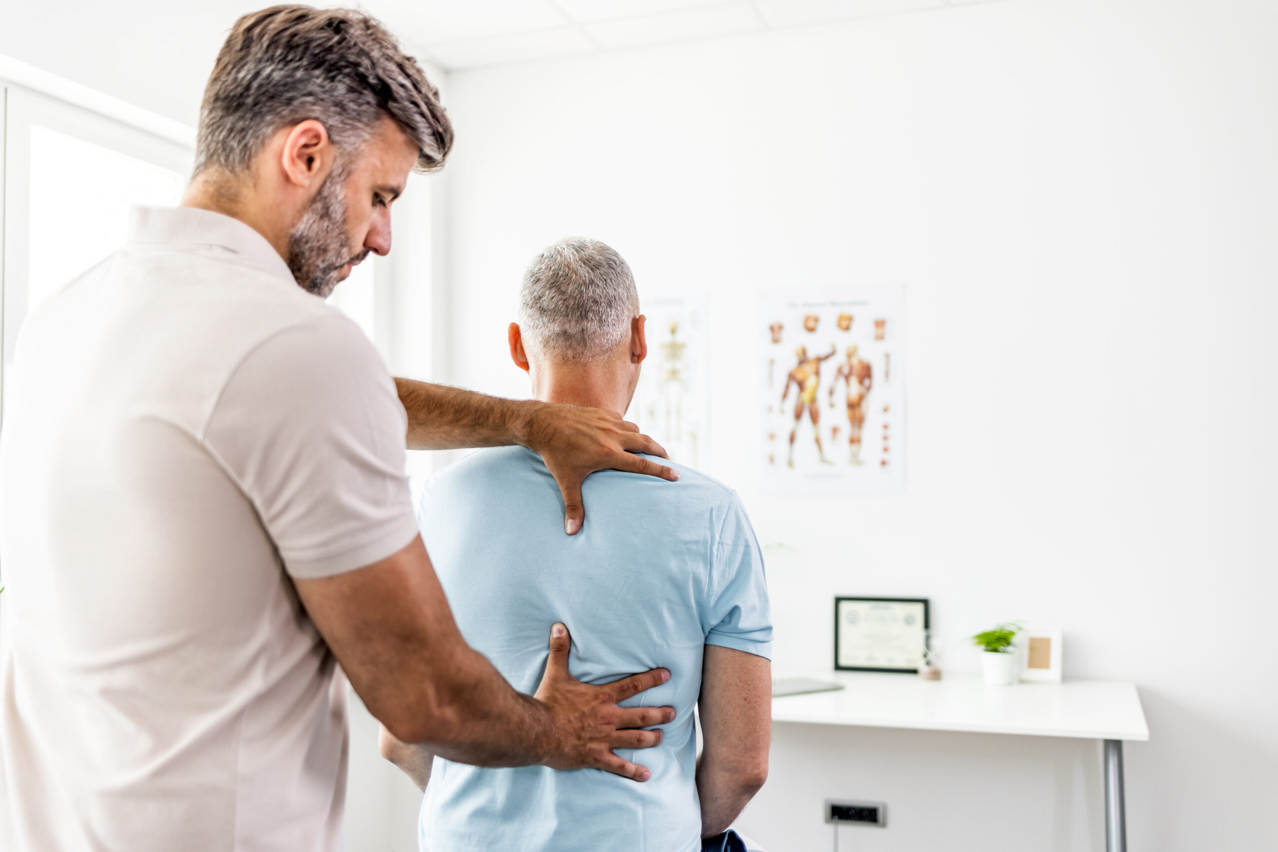 Dr. Tony Lane performing chiropractic adjustment