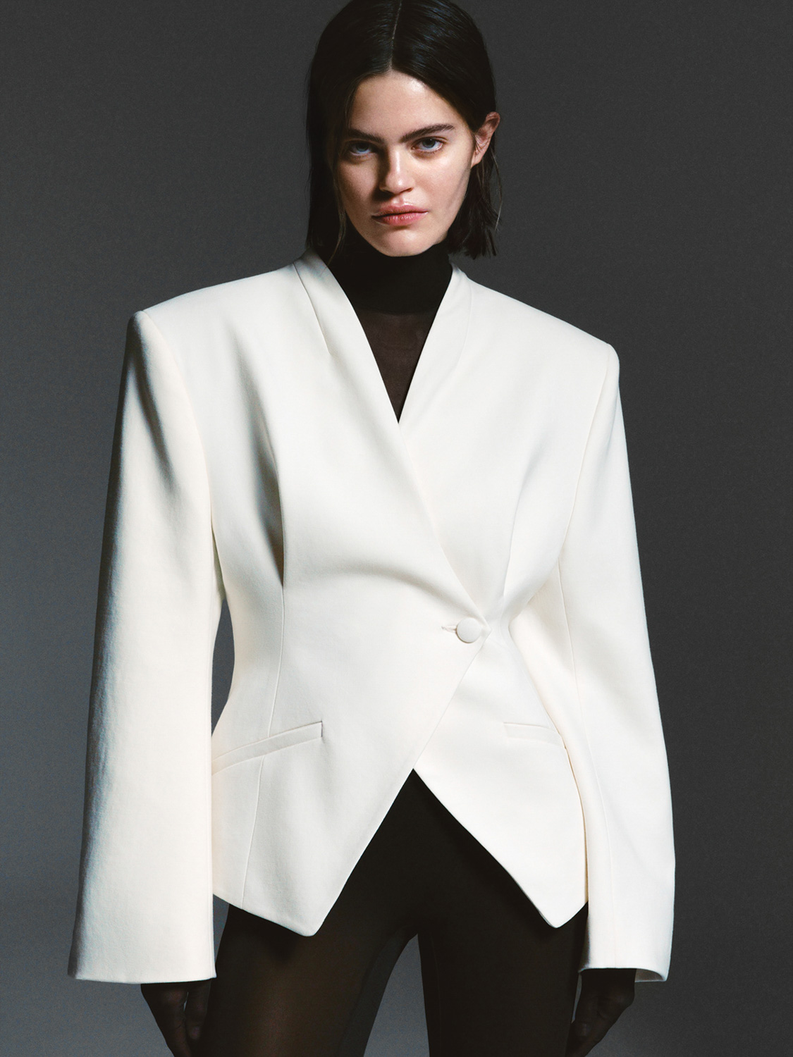 Lookbook — white blazer on dark background