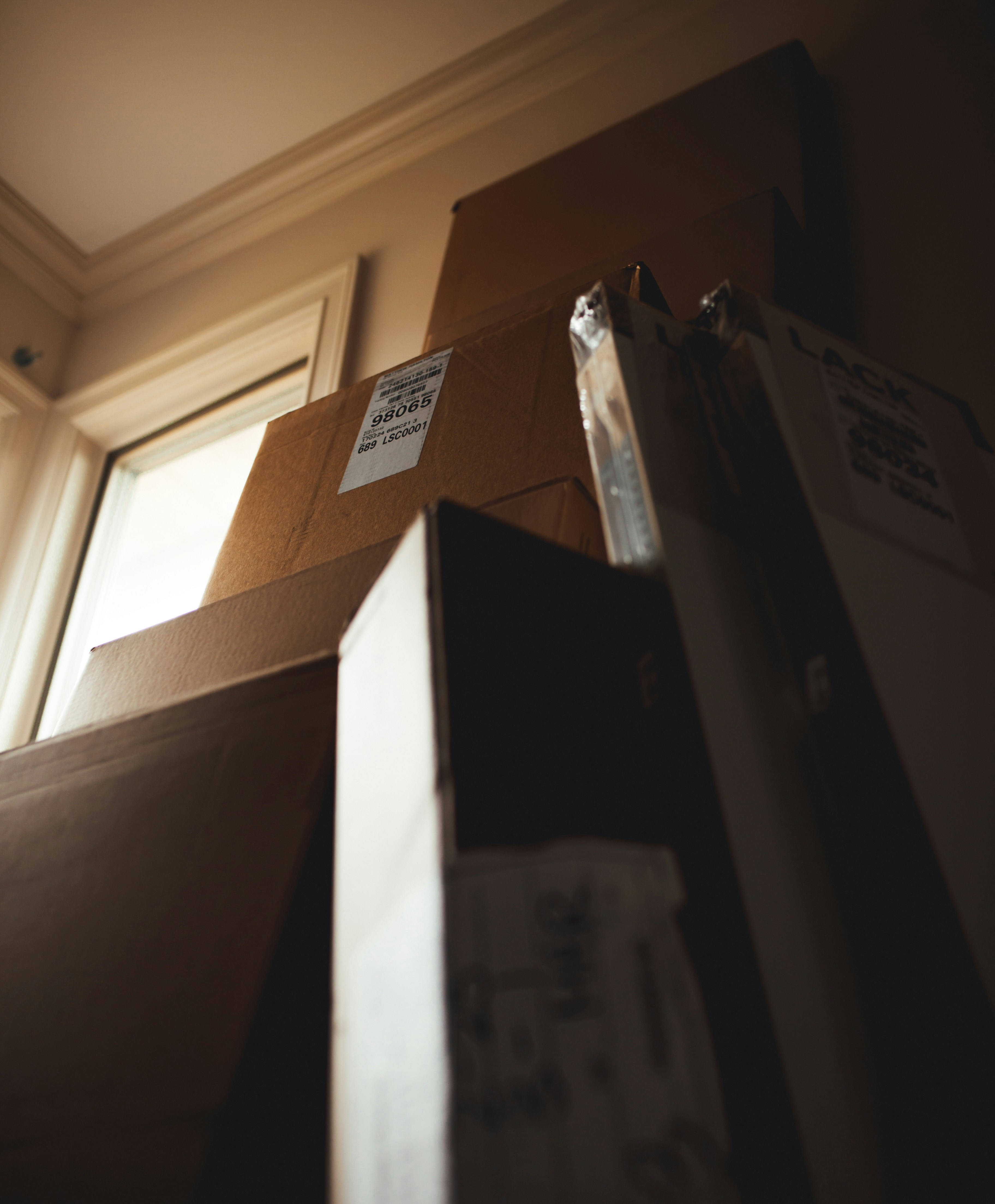 Stacked moving boxes in Waunakee home ready for relocation