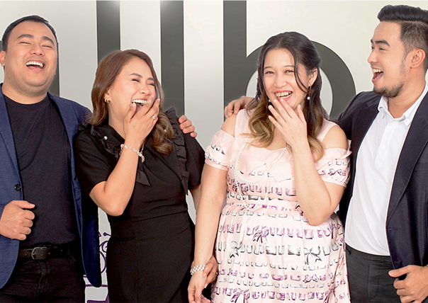 Callbox team members laughing together