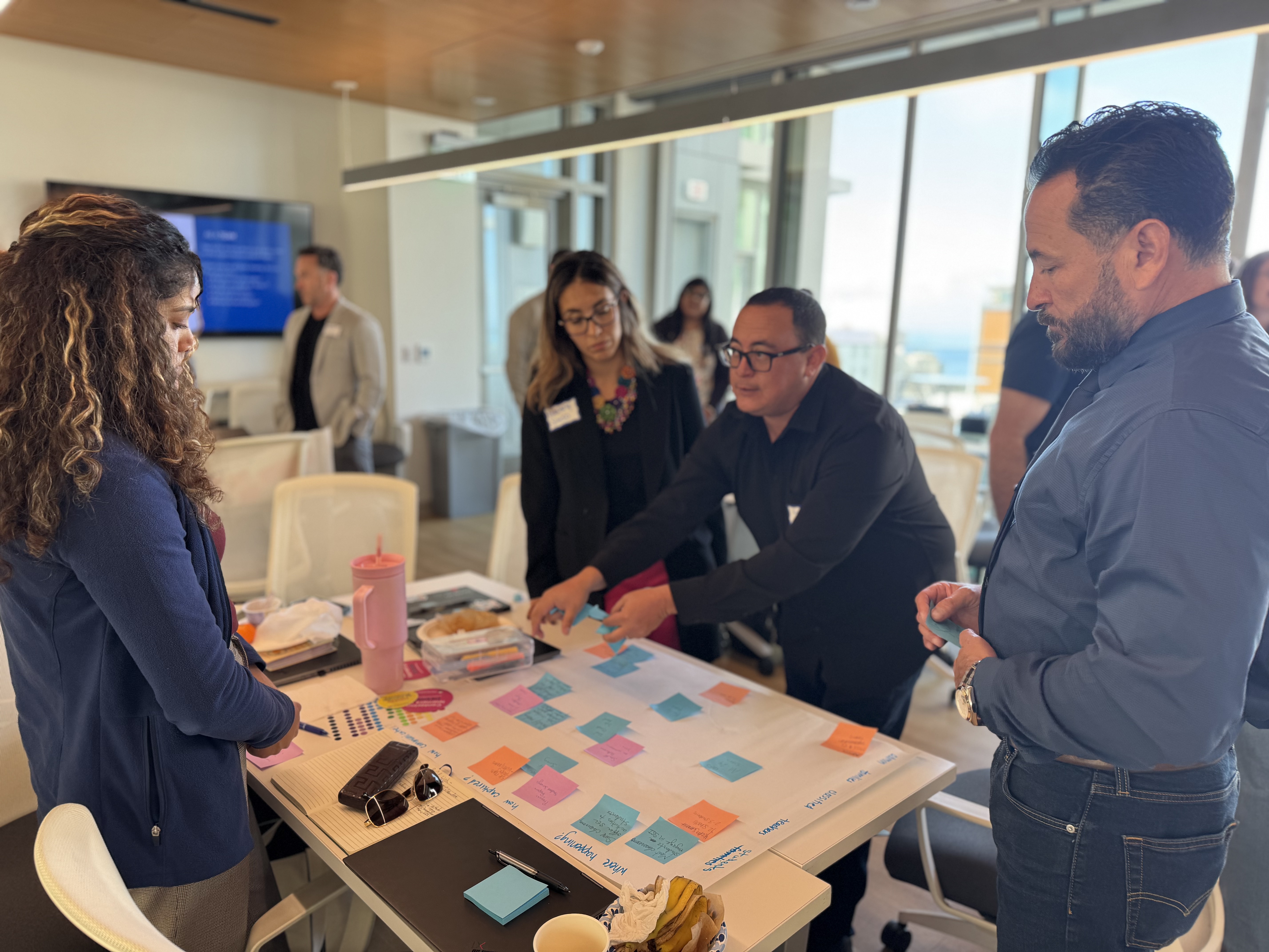 Educators planning with colorful sticky notes